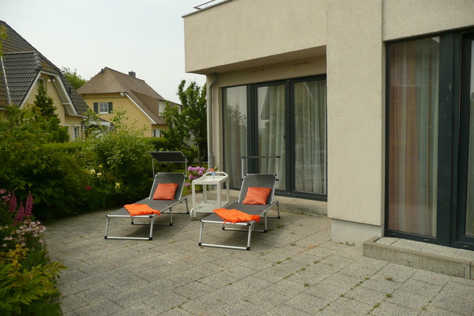 Ferienwohnung in Börgerende - Appartement 1 - Familiensuite - Terrasse im Garten
