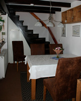 Ferienhaus in Mukran - Kunze - Essecke mit Treppenaufgang ins Obergeschoss