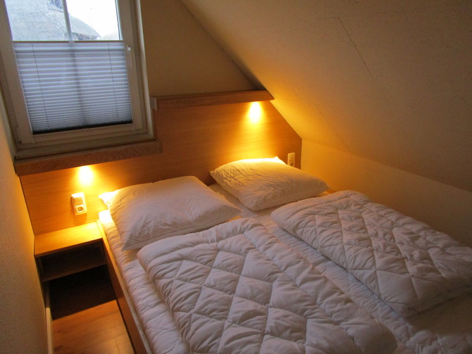 Ferienhaus in Börgerende - Haus Ostseeblick Sanddorn - Schlafzimmer 1 mit Doppelbett