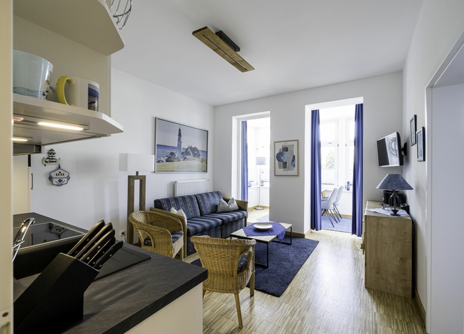 Ferienwohnung in Kühlungsborn - Ostsee-Domizil Sandburg - Wohnraum, Blick zum Wintergarten