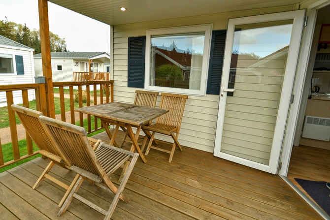 Ferienhaus in Pelzerhaken - Mobilheim  Pacifique - Terrasse mit Sitzm&ouml;beln