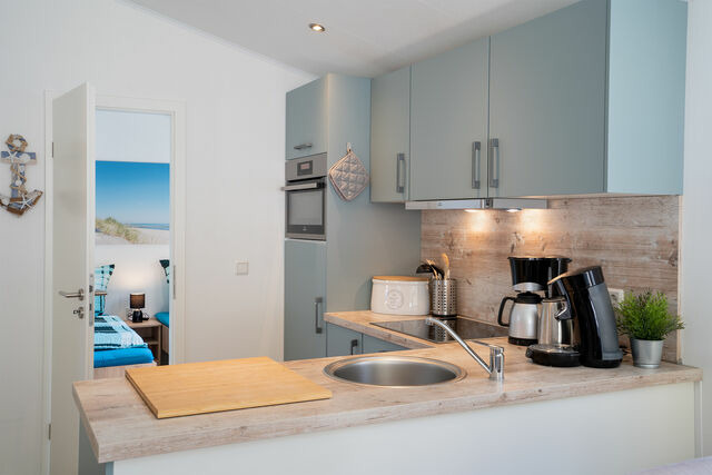 Ferienhaus in Scharbeutz - Casa del Mar Scharbeutz - Sauna kostenlos - 1 kleiner Hund willkommen - umzäunter Garten - Bild 7