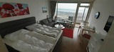 Ferienwohnung in Travemünde - Strand-Süd-Apartment **Panorama Lounge** im 31. OG mit Ostsee-Trave-Priwall-Altstadt-Hafenblick - Bild 3