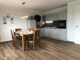 Ferienhaus in Fehmarn OT Gammendorf - Feriendomizil SeeSand 2 - Küche mit Essbereich