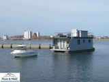 Ferienwohnung in Fehmarn - Hausboot Kaddi`s Sunshine - Huus & Meer - Bild 1