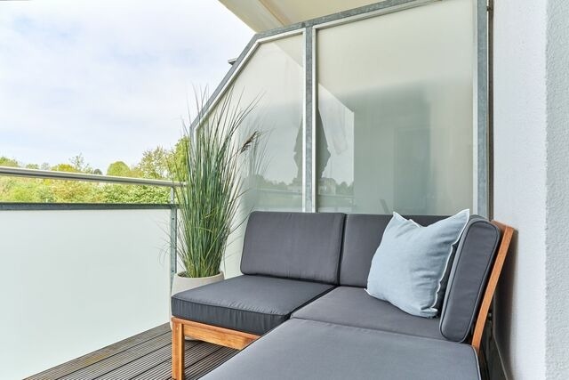 Ferienwohnung in Scharbeutz - Sommerlounge - Bild 13