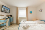 Ferienwohnung in Boltenhagen - Ferienhaus Am Leuchtturm, Ferienzimmer 2 "Seeschwalbe" - Bild 1