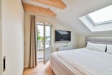 Ferienwohnung in Sellin - Ferienwohnung Weitblick mit gro&szlig;em Balkon, Sauna, Kaminofen im OG - Bild 12