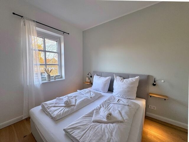 Ferienwohnung in Fehmarn OT Orth - Piratenschiff - First-Class Auszeit mit privaten Spa, Kamin, Meerblick & Gym - Bild 7